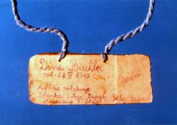 The tag that Dina Büchler was wearing around her neck when she was smuggled out of the Loborgrad camp.