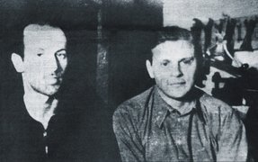 David Zivcon and Roberts Seduls (left to right) in the basement hiding place, Liepāja, 1944.