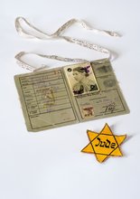 Yellow star, identification card, and cloth ribbon
