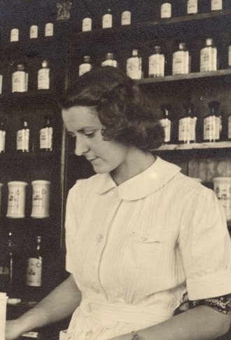 Aurelia Danek-Czort in the Pod Orłem pharmacy, around 1942.