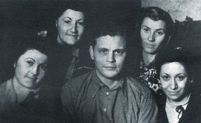 The hidden Jews Riva Zivcon, Henni Zivcon, and Hilde Skutelski (1st, 2nd, and 4th from left) with their rescuers Robert Seduls and Tonija Pļūkše (3rd and 5th from left), Liepāja, 1944.