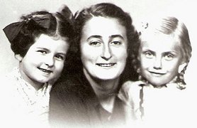 Vesna Domany (left) with her mother Eva Domany and Silva Fuchs, the daughter of her rescuer, Zagreb, 1945.